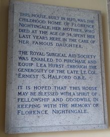 Lea Hurst entrance hall plaque. The text reads: 'This house, built in 1820, was the childhood home of Florence Nightingale. Her mother, who died at the age of 94, spent her last years here in the care of her famous daughter. The Royal Surgical Aid Society was enabled to purchase and equip Lea Hurst through the generosity of the late Lt. Col. Ernest S. Halford O.B.E. It is hoped that this house may be blessed with a spirit of fellowship and goodwill, in keeping with the memory of Florence Nightingale.'